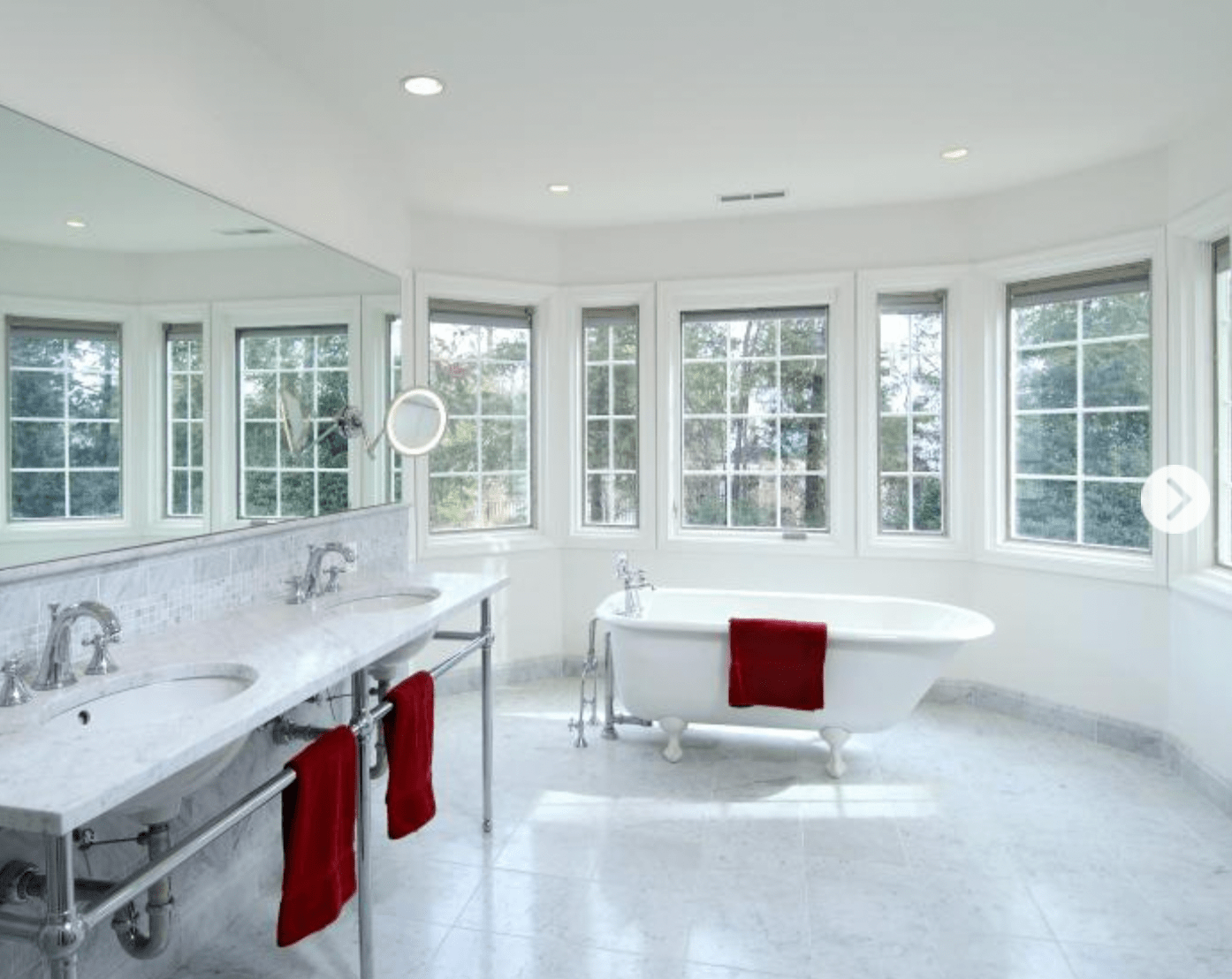 white bathroom with clawfoot tub
