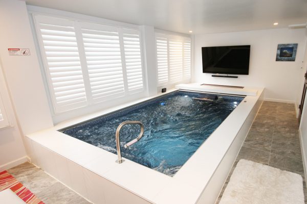 contemporary endless pool with tv