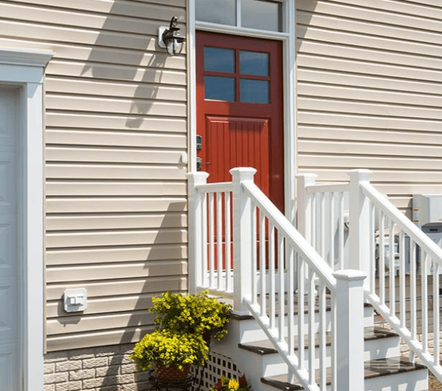 porch steps and red door