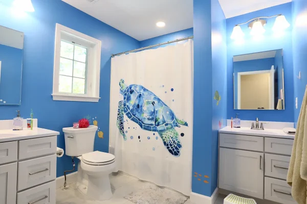 blue bathroom with shower curtain