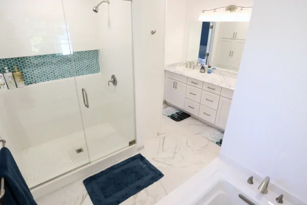 white bathroom with glass shower