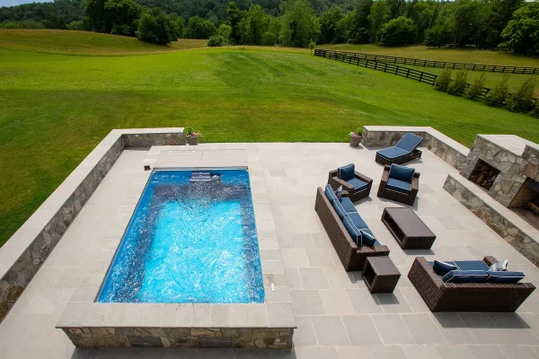 outdoor pool with seating area overhead