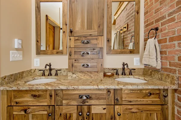 rustic bathroom with hickory cabinets