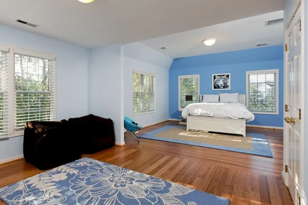 bedroom with blue wall and bean bags