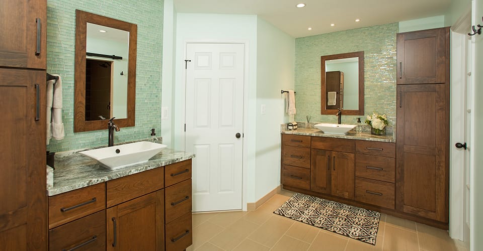 bathroom with wood cabinets
