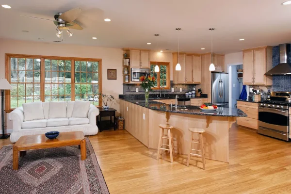 spacious bethesda kitchen island and living room couch