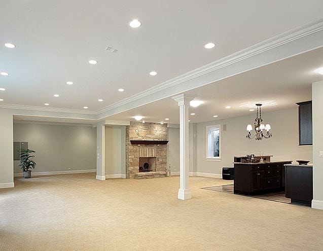 empty basement with fireplace